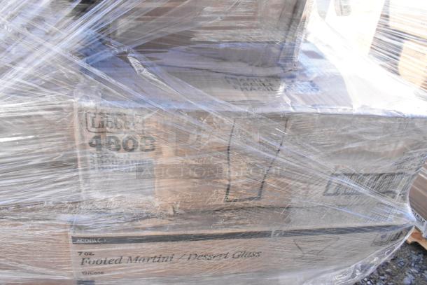 Sealed pallet of 33 mixed items, new scratch and dent condition, including tumblers, lab coats, glasses, and plates.