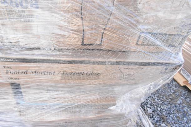 Pallet wrapped with Acopa 7 oz. footed martini/dessert glass boxes, 12 per case. Brand new scratch and dent items.