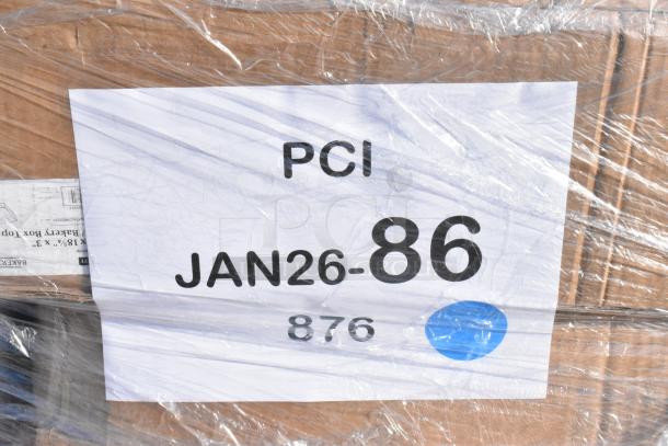 Plastic-wrapped cardboard box with label reading "PCI JAN26-86 876." Contains assorted new scratch and dent items.