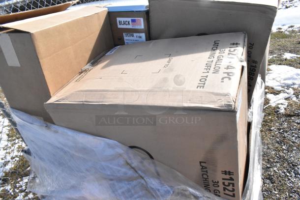 Cardboard boxes labeled "#1527, 30 Gallon Latching Tuff Tote" amidst snow, containing assorted new scratch and dent items.