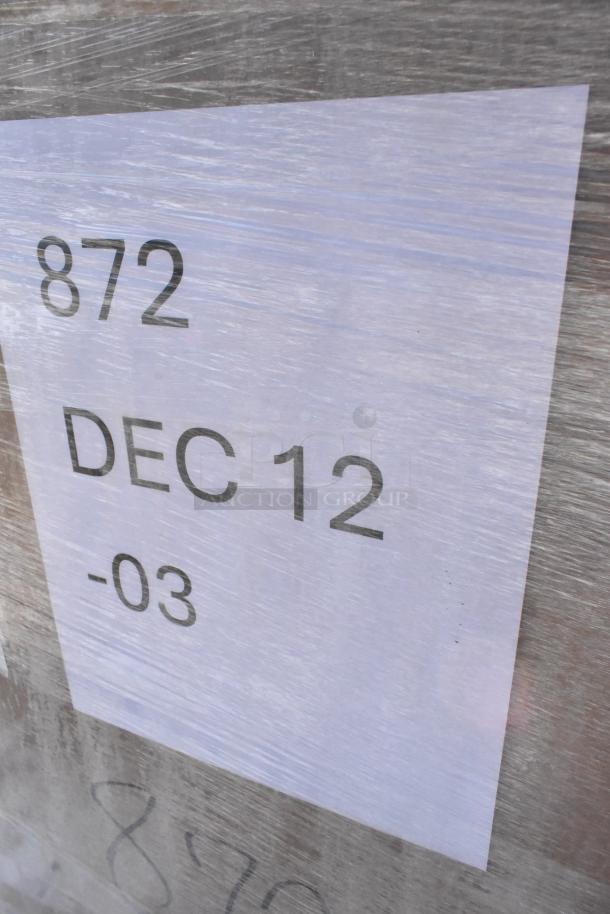 Set of 23 new scratch and dent items, including napkins, containers, towels, and mixing glasses. Label reads "872 DEC 12-03".