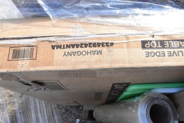 Box labeled "Live Edge Table Top" in Mahogany; part of 13 new scratch and dent items including a blender station, tumblers, tabletops.