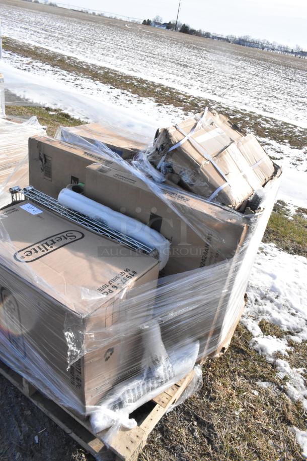 Pallet of 13 new scratch and dent items including boxed blender station. Items wrapped in plastic, box shows Sterilite logo.