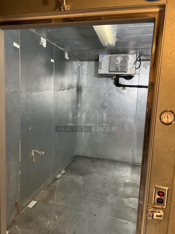 Norlake walk-in combo box interior, 18'x6'x8', metal walls, equipped with an evaporator fan, moderate wear visible.