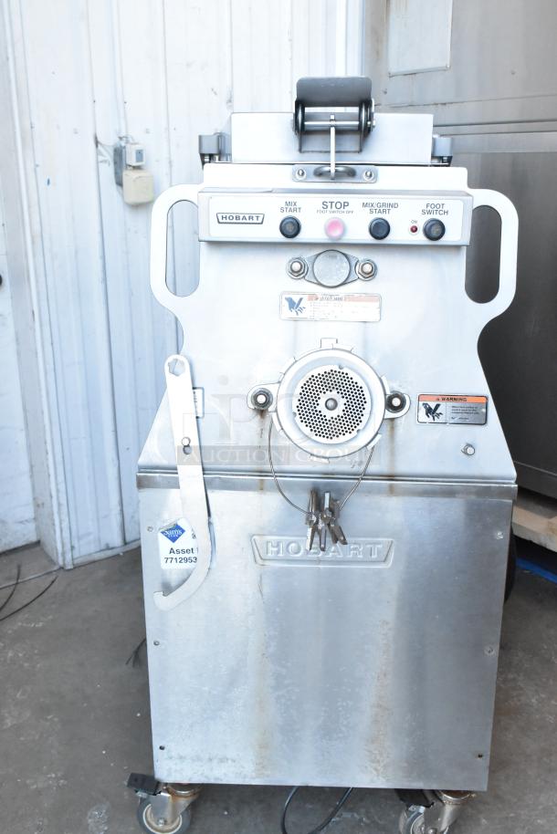 2016 Hobart MG2032 meat mixer grinder, electric, foot pedal, 208V, 3-phase, on casters. Tested and working condition.