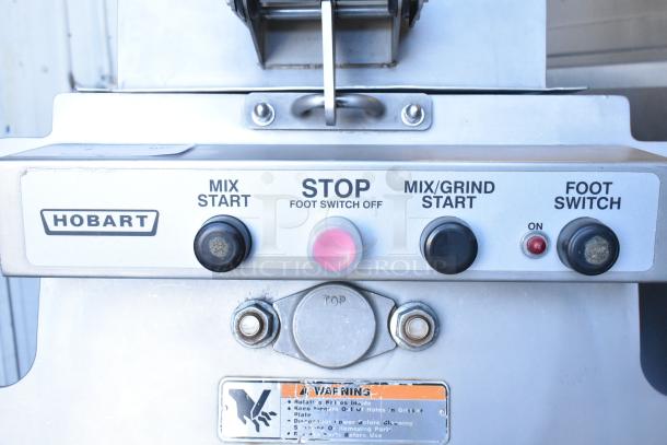 2016 Hobart MG2032 meat mixer grinder with control panel and labels, features foot pedal and commercial casters.
