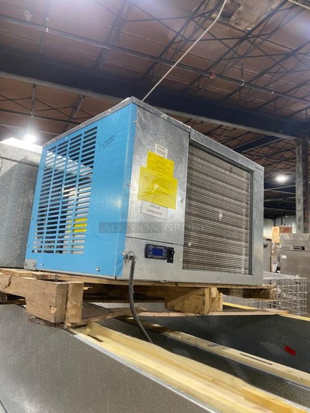Blue Virex industrial HVAC unit on pallet. Features include metal casing, ventilation grills, and a digital control panel. Visible labels display safety warnings. Good condition.