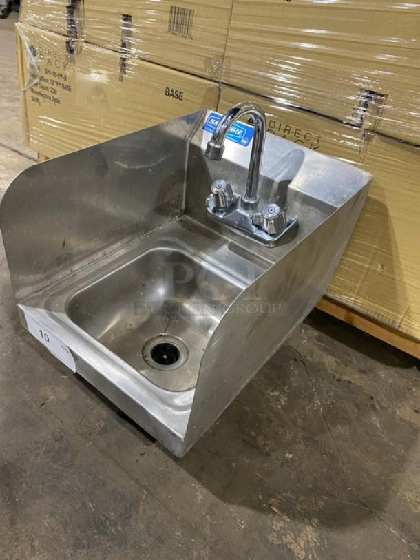 Stainless steel wall-mounted hand sink with gooseneck faucet, good condition, model tag visible, numbered tag "10" attached.