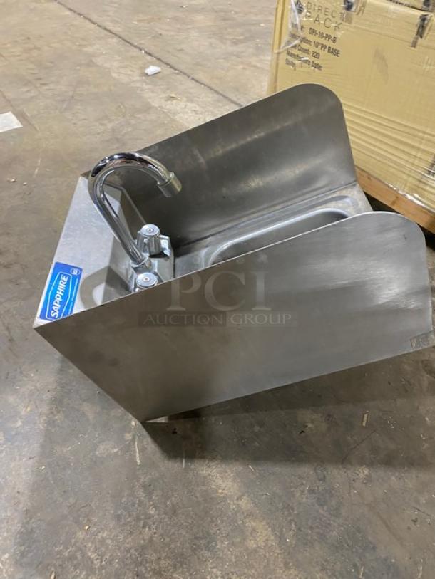 Stainless steel hand sink with faucet, branded "Sapphire," in good condition. Ideal for commercial kitchen use.