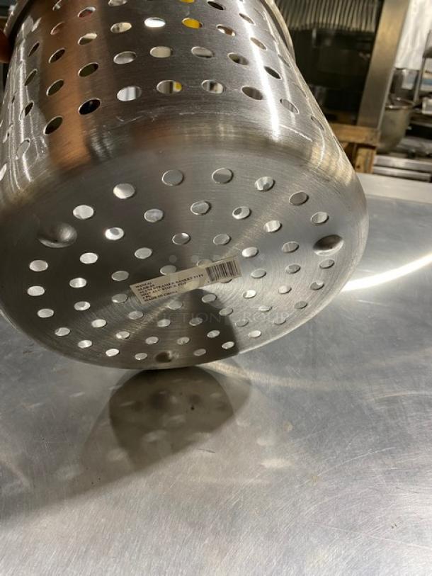 Perforated stainless steel cylinder with durable construction and barcode label on the base, in excellent condition.