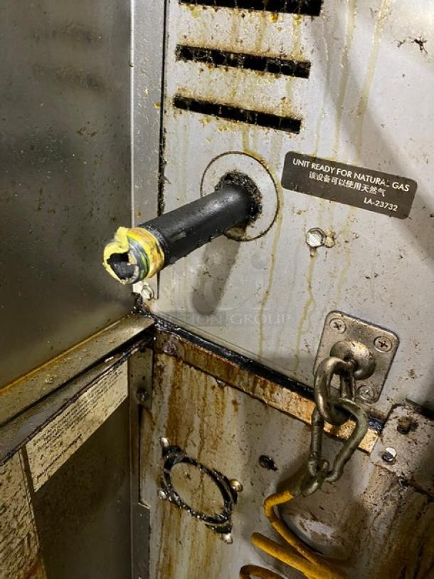 Industrial gas appliance connection point, visible wear, labeled "Unit Ready for Natural Gas," model LA-23732.