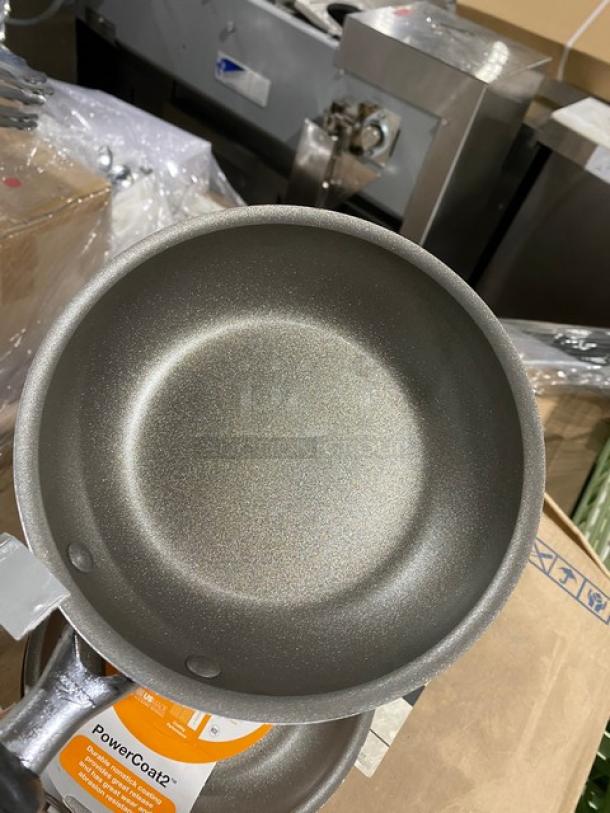 Non-stick frying pan with a metallic finish, labeled "PowerCoat2" for durability. New condition, ideal for quality cooking.
