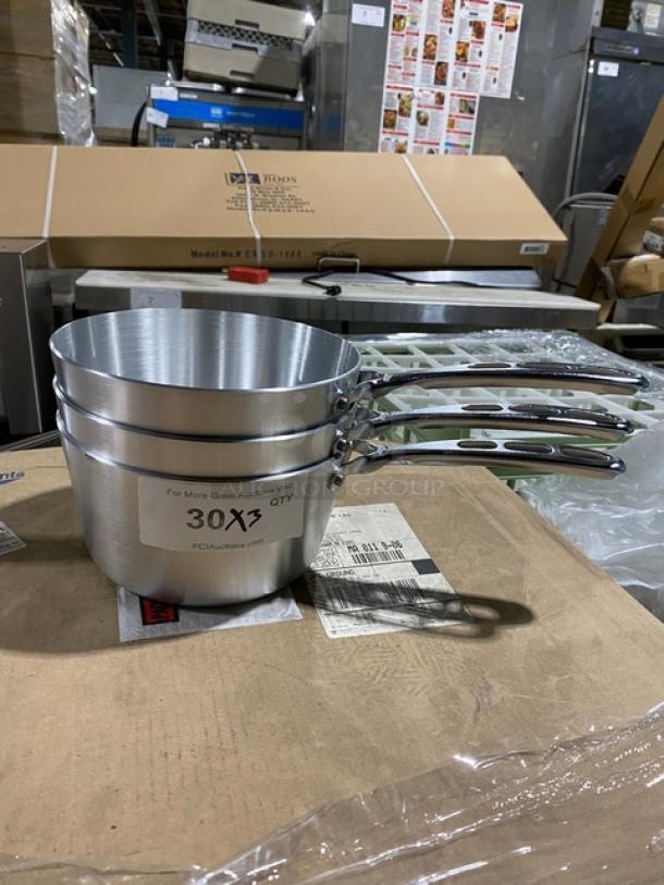 Three stacked stainless steel saucepans with ergonomic handles in excellent condition. Label reads "30 X3 Qty."