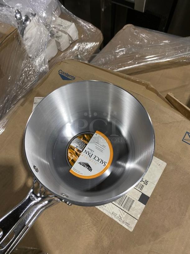 Aluminum sauce pan with stainless steel handle, new condition, All-Clad branding, label indicates model and specifications.