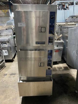 Alto-Shaam holding cabinet, stainless steel, double door, blue control panels, model label partially visible, used condition.