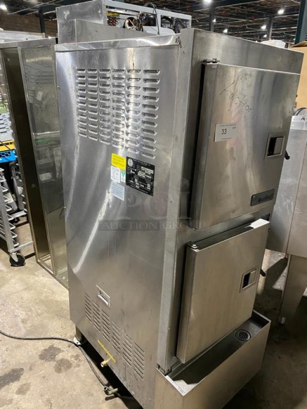 Commercial stainless steel food warmer, dual compartments, Hamilton brand, Model PC9MP, used, visible wear, auction tag number 33.