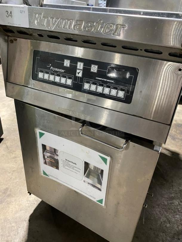 Frymaster commercial fryer, stainless steel, digital controls, model with "Computer Magic" panel, used condition, auction tag visible.