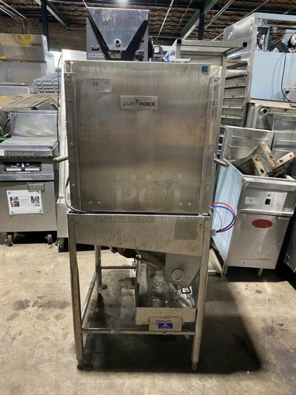 Commercial stainless steel dishwasher with PureForce branding, industrial-grade, used condition, visible control panel.