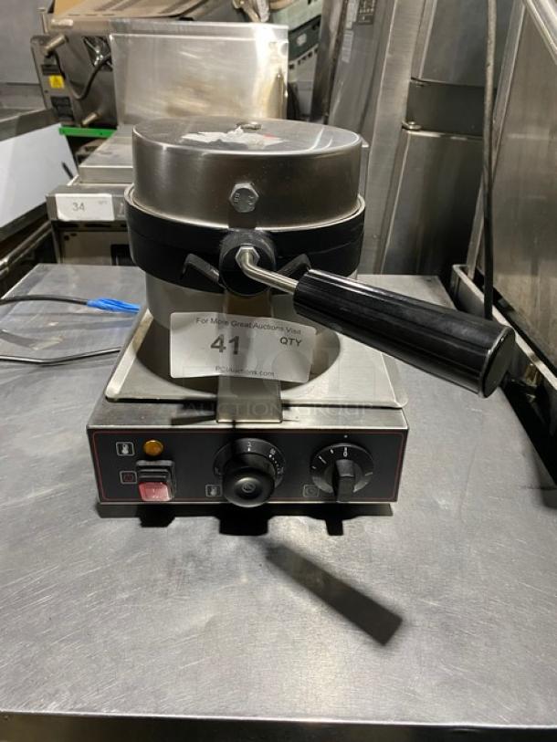 Commercial waffle maker with temperature controls, stainless steel finish, and labeled auction tag number 41.