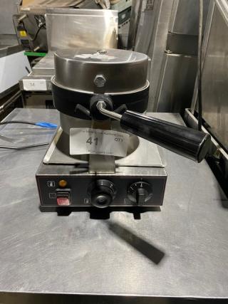 Commercial waffle maker with temperature controls, stainless steel finish, and labeled auction tag number 41.
