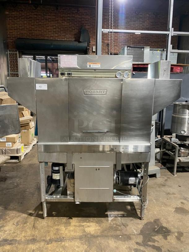 Hobart commercial dishwasher, stainless steel, industrial model with visible dials and controls, in used condition.