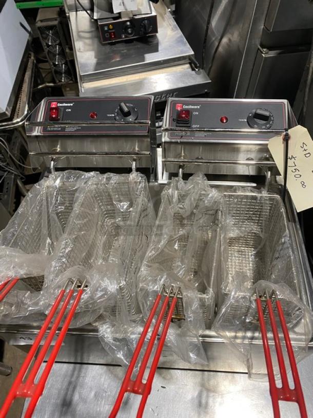 Dual commercial deep fryers with red-handled baskets, clean and unused. Visible tag reads "$350.00."