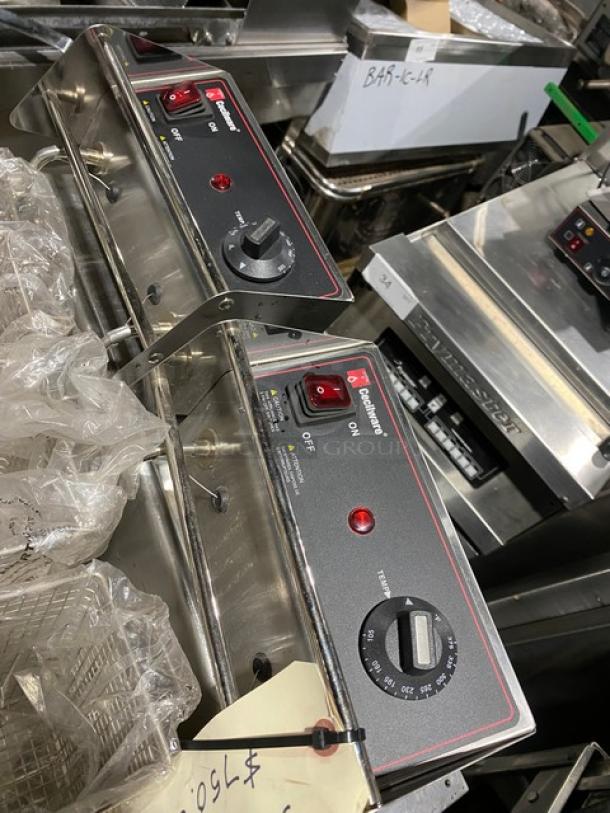 Countertop deep fryers with dual controls, stainless steel finish in used condition, indicating restaurant equipment auction.
