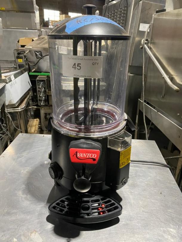 Avantco beverage dispenser with transparent chamber, black base, and control knob. Label indicates model and auction details.