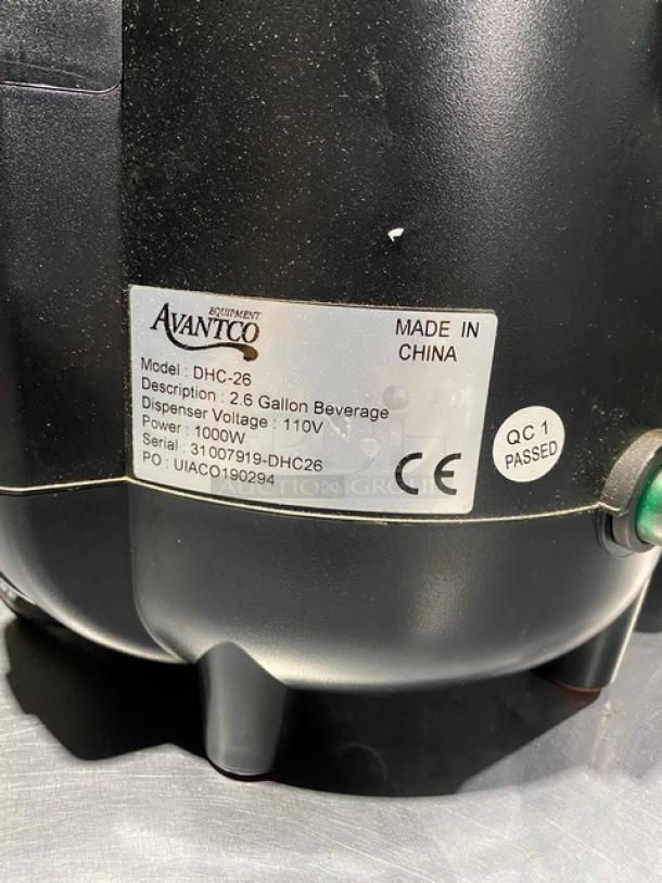 Avantco DHC-26 beverage dispenser, 2.6-gallon capacity, 110V, 1000W, black; tag shows model, serial number, and QC passed.