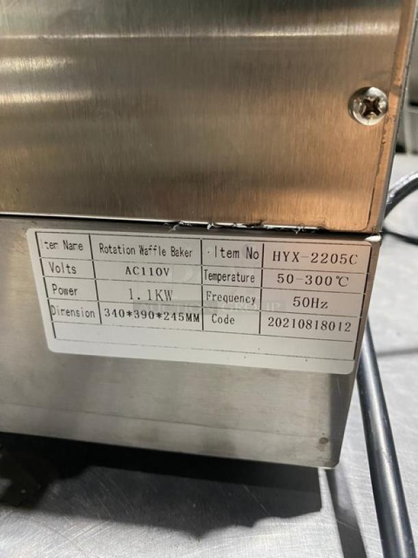 Stainless steel rotation waffle baker, model HYX-2205C, AC110V, 1.1KW, 50-300°C, dimensions 340x390x245mm. Code: 20210818012.