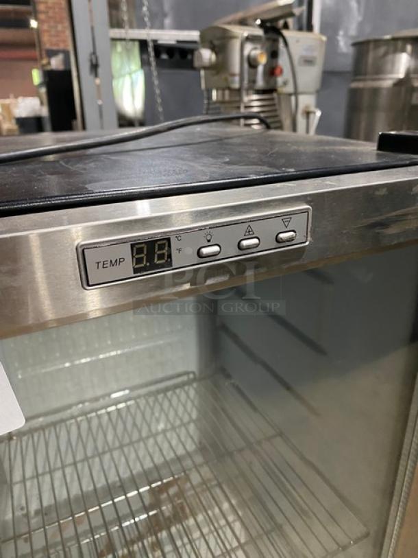 Stainless steel beverage cooler, digital temperature display, wire shelving, gently used condition, perfect for bar or restaurant.