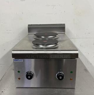 Prepline stainless steel electric cooktop with two burners, model PPHC12-S, in excellent condition. Dual control knobs.