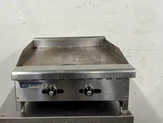 Radiance commercial griddle, stainless steel, dual control knobs, used condition, visible branding on front panel.