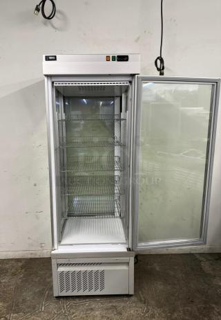 Commercial glass-door refrigerator, four wire shelves, white interior, clean condition, visible LED temperature display.