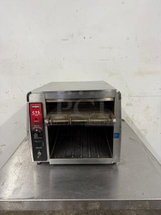 Waring CTS conveyor toaster in good condition, stainless steel, adjustable conveyor speed, power saver mode.