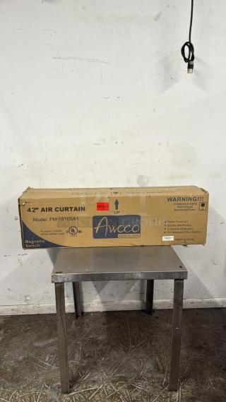 Awoco 42" air curtain, model FM-1510SA1, new in box. Features magnetic switch, UL listed, powder-coated metal case.
