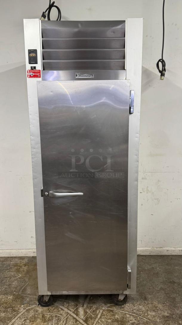 Alto-Shaam stainless steel holding cabinet, single door, on casters, with digital display, minor surface wear.