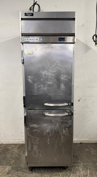 Beverage-Air Horizon Series commercial refrigerator, stainless steel, dual doors, used condition with visible markings, wheels for mobility.