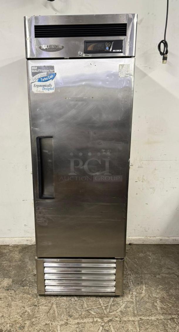 Commercial stainless steel refrigerator in good condition, featuring digital controls and ergonomic design. Maximum brand, Turbo Cool label.