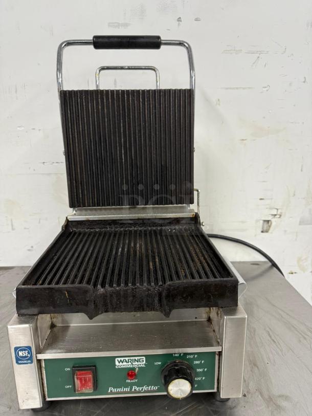 Waring Commercial Panini Perfetto press, ribbed plates, adjustable temperature, used condition, NSF certified.
