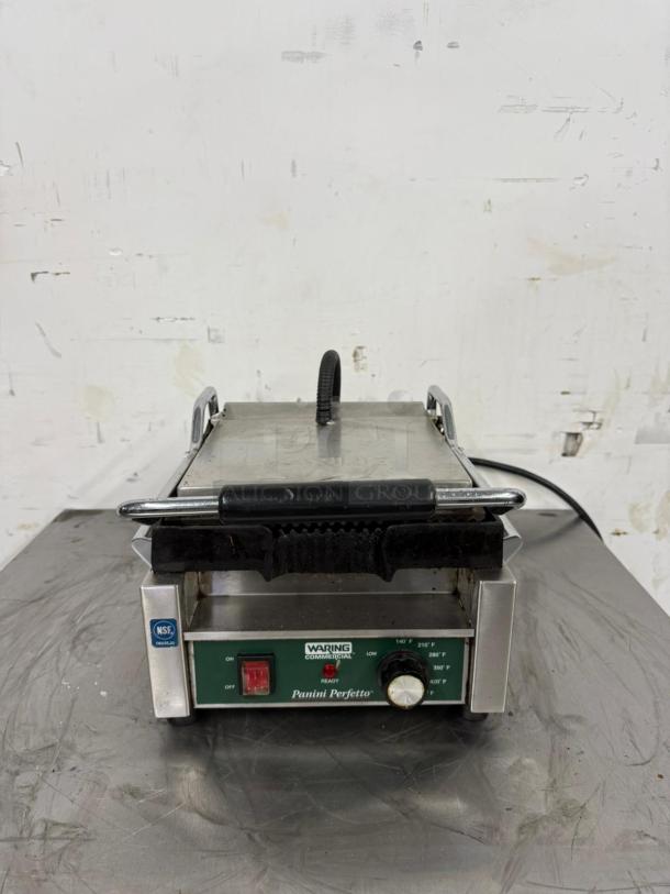 Waring Commercial Panini Perfetto grill, stainless steel, NSF certified, visible wear, with temperature control dial.