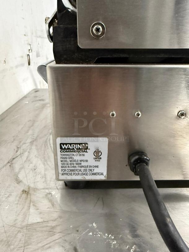 Waring Commercial panini grill, model WPG150. Stainless steel, 120V, 1800W, commercial use only, good condition.