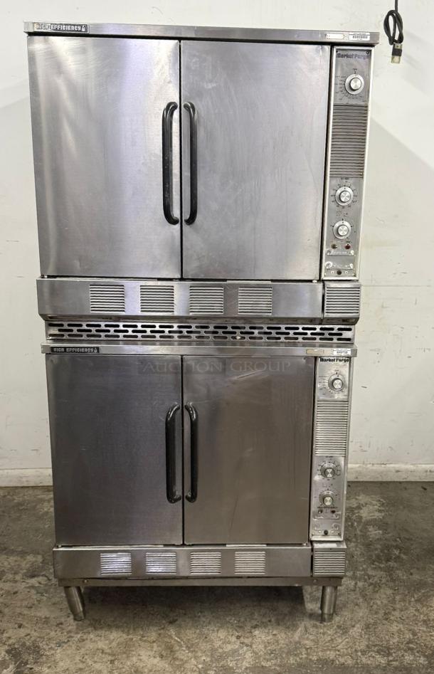 Stainless steel Market Forge convection oven, dual compartments, used condition, temperature dials, high efficiency label.