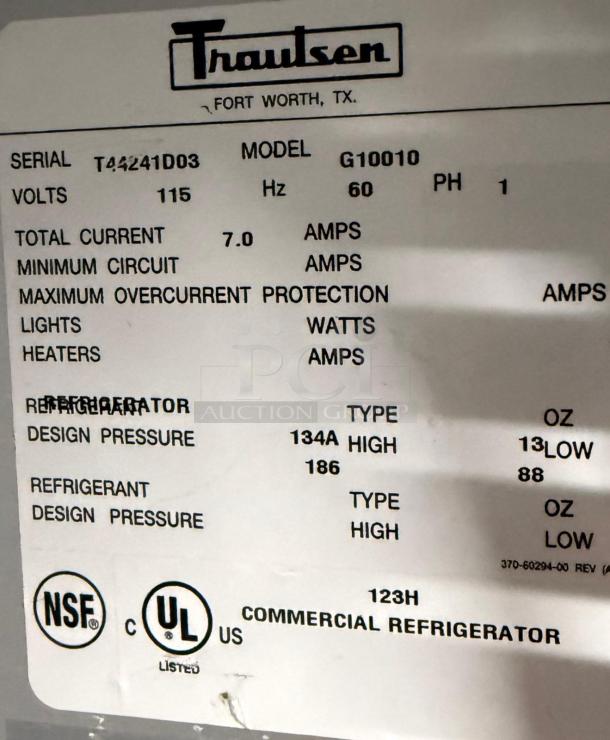 Traulsen commercial refrigerator label, Model G10010, Serial T44241D03, Volt 115, Hz 60, UL/NSF listed.