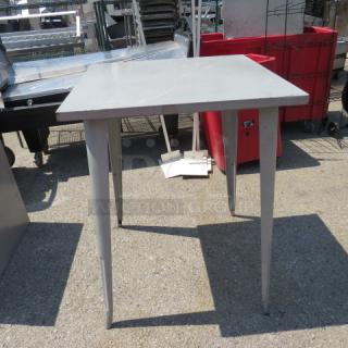 Aluminum bar height patio table, 31.5x31.5x41.5 inches, in used condition.