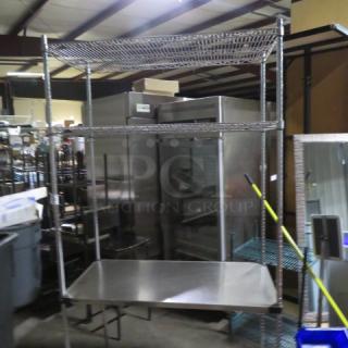 One Metro shelf unit with three wire shelves and one solid shelf. Dimensions 48x24x87 inches, in good condition.