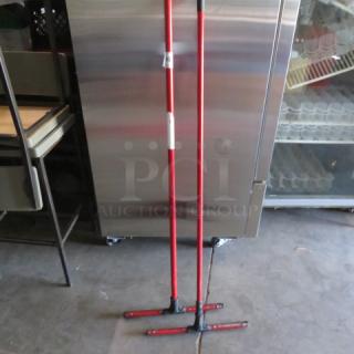 Red Squeegee with long handle, model 2XBID, in excellent condition, suitable for industrial use.