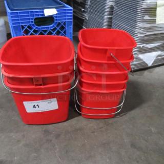 One lot of 8 assorted size red Sani buckets with metal handles, shown against industrial background. Label indicates "41 QTY."