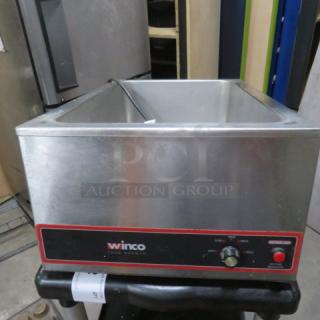 Winco FW-S500 Food Warmer, stainless steel, 120V, with control knob, dimensions 22.5x15x9.5 inches, good condition.