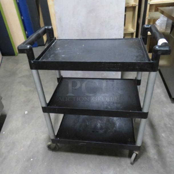 Winco Poly 3 Shelf Cart, Model UC-2415, on casters, 31x16x37 inches, black shelves, silver frame, lightly used condition.